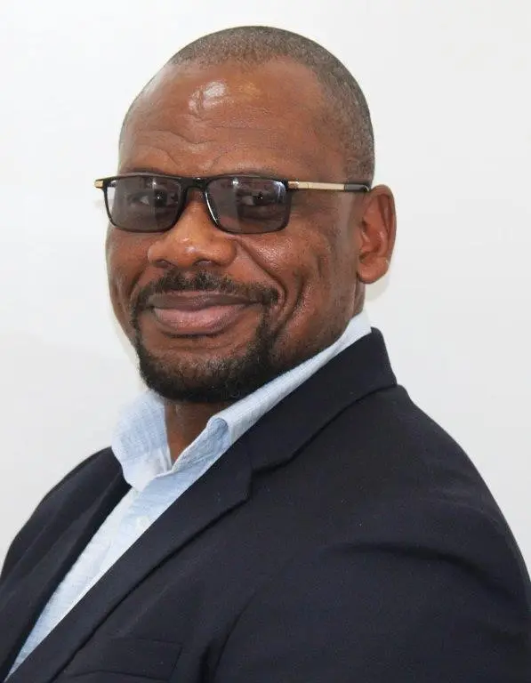 Dr. Newton Demba
